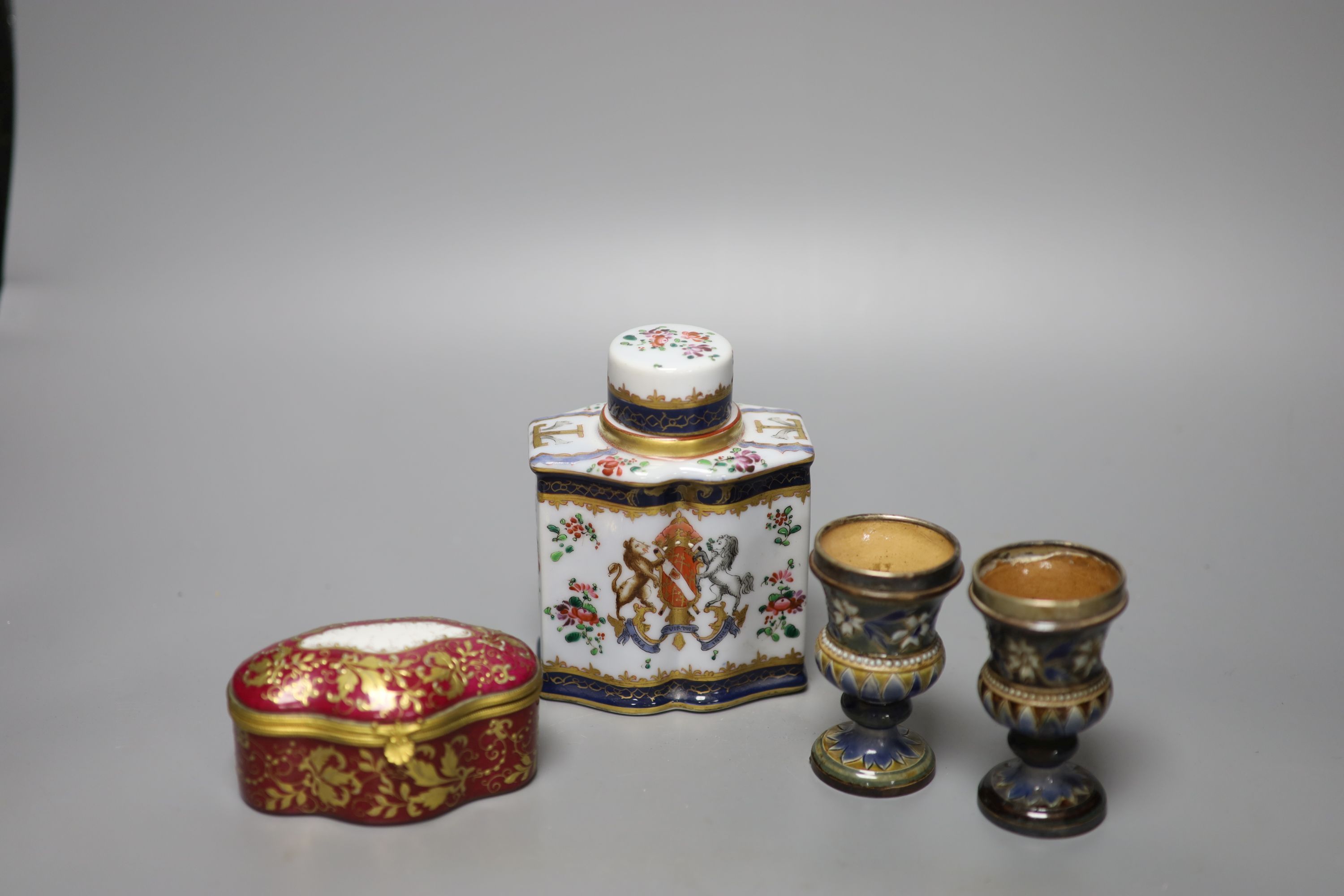 A Samson crested porcelain lidded tea caddy, height 13cm, together with a Limoges lidded porcelain casket,